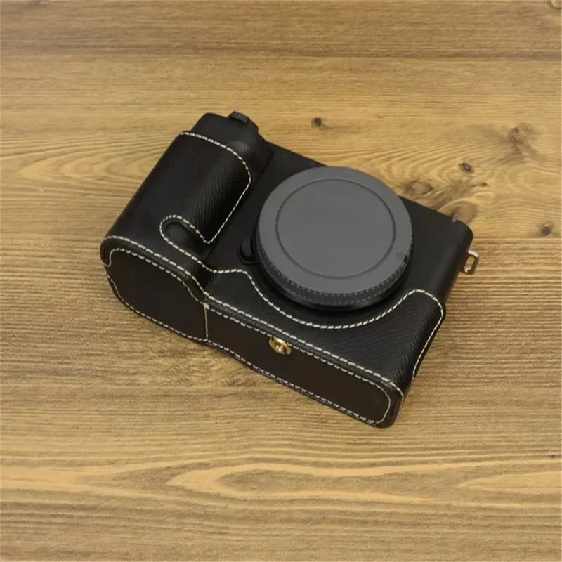 For Sony ZV-E1 Battery Opening Design PU Leather Camera Bottom Cover Half Body Case with Hand Strap - Black