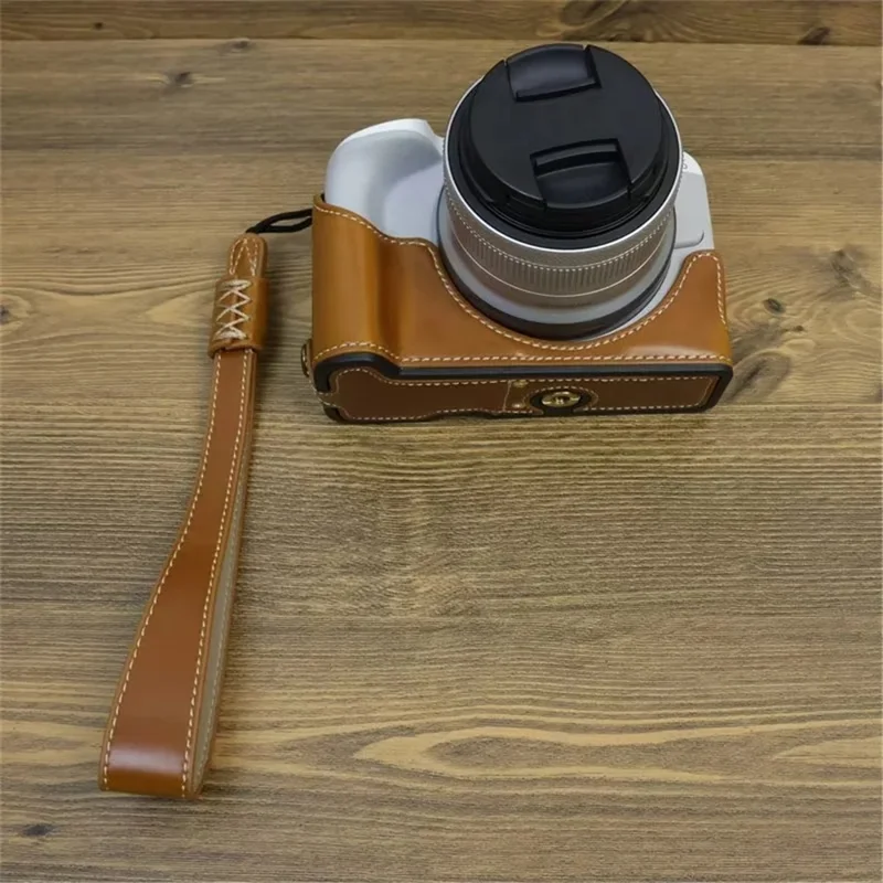 Para Canon EOS R50 / R100 Cubierta de Cámara de Cuerpo Inferior de Cuero PU con Correa de Muñeca - Marrón