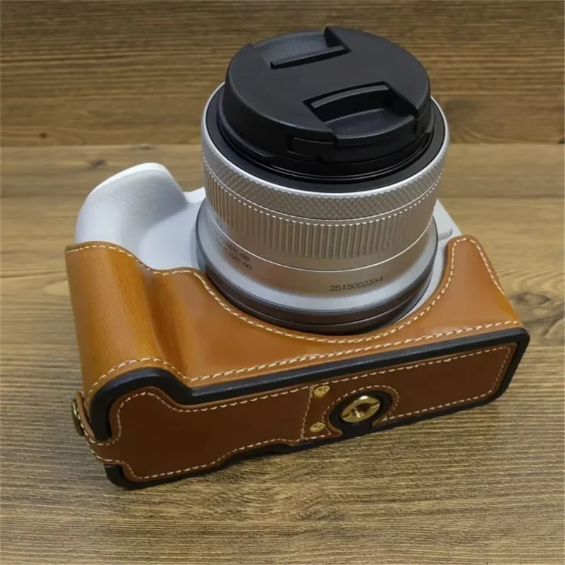 Para Canon EOS R50 / R100 Cubierta de Cámara de Cuerpo Inferior de Cuero PU con Correa de Muñeca - Marrón