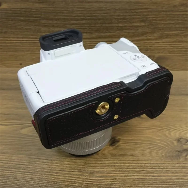 For Canon EOS R50 / R100 Genuine Cow Leather Camera Bottom Case Anti-drop Cover with Wrist Strap - Black