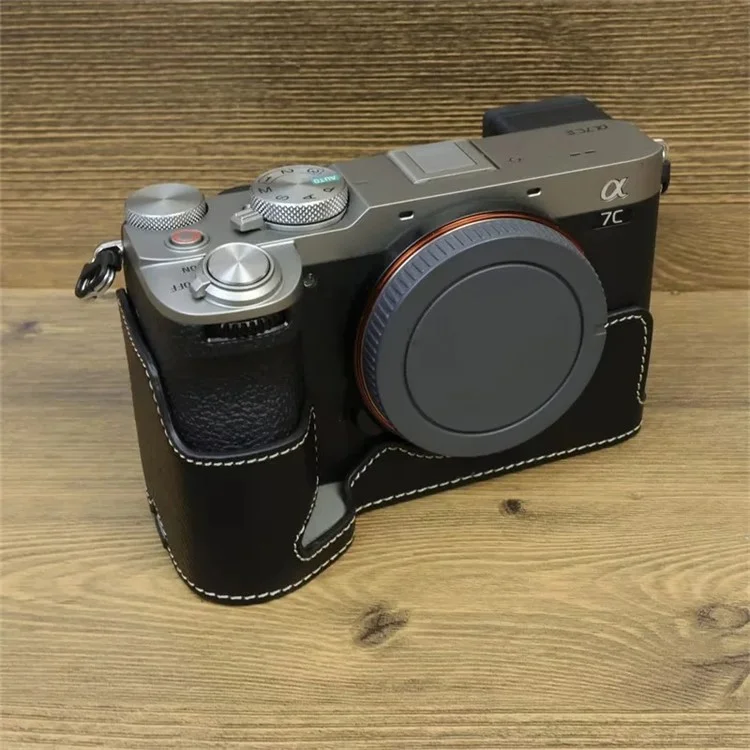 Para Sony A7C II / Caja de cámara A7CR PU Leather Anti-Drop Half Body Cover con correa de muñeca - Negro
