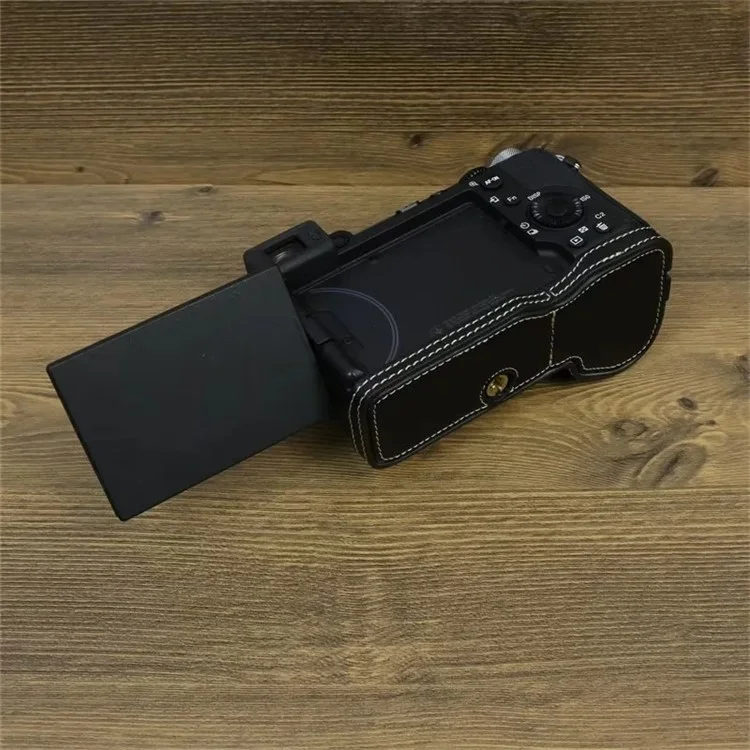 Para Sony A7C II / Caja de cámara A7CR PU Leather Anti-Drop Half Body Cover con correa de muñeca - Negro