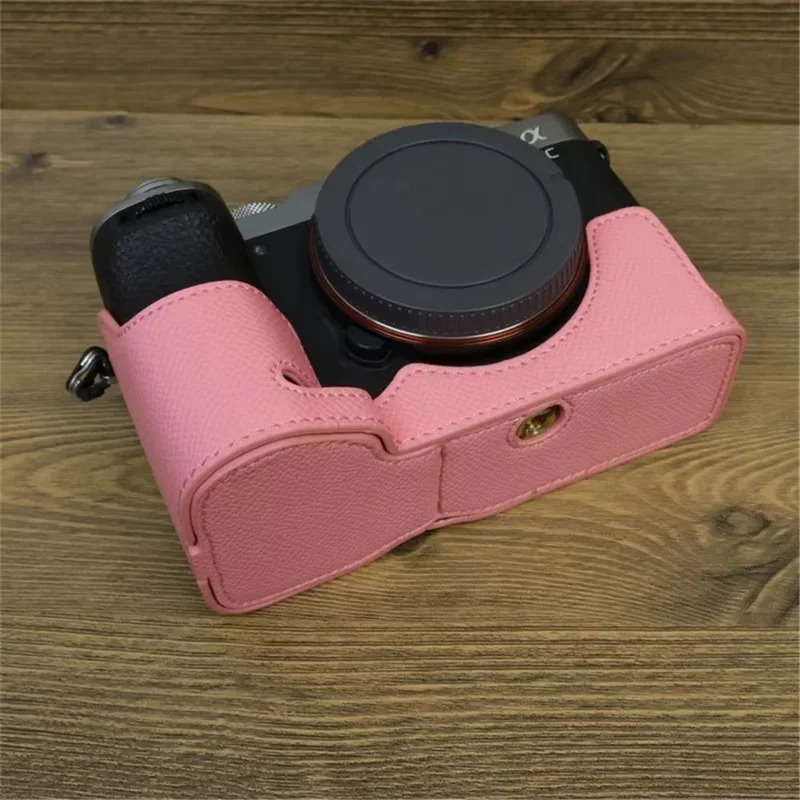 For Sony A7C II / A7CR Camera Bottom Case PU Leather Anti-Drop Half Body Cover with Wrist Strap - Pink
