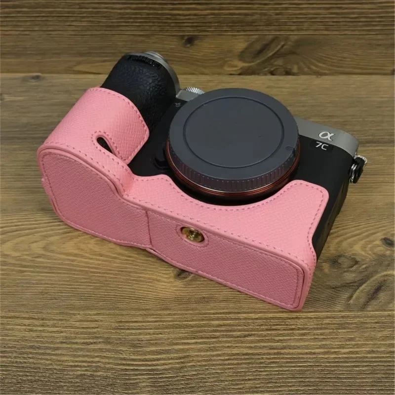 For Sony A7C II / A7CR Camera Bottom Case PU Leather Anti-Drop Half Body Cover with Wrist Strap - Pink