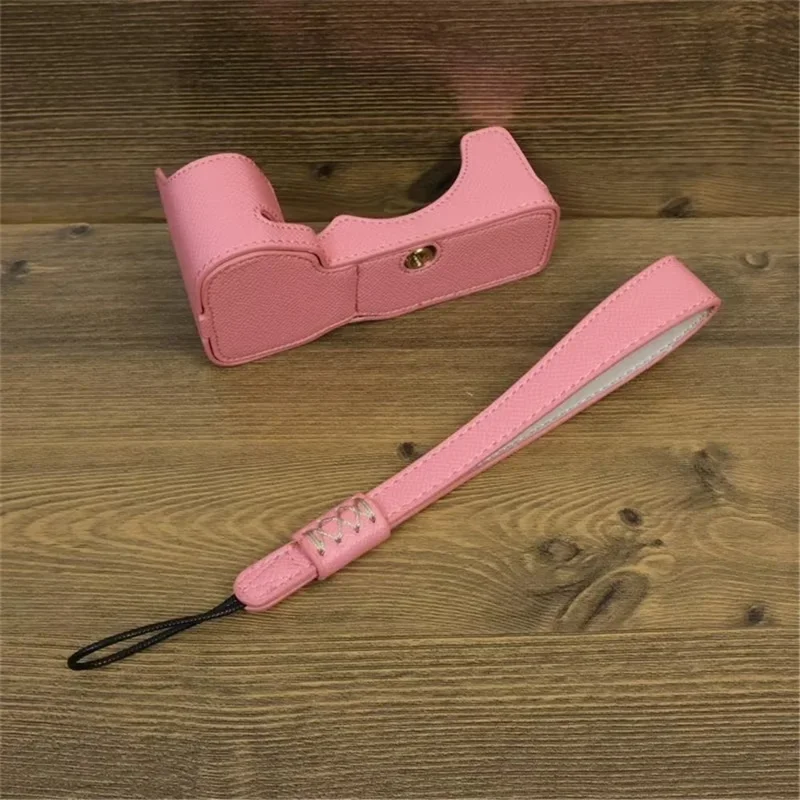 For Sony A7C II / A7CR Camera Bottom Case PU Leather Anti-Drop Half Body Cover with Wrist Strap - Pink