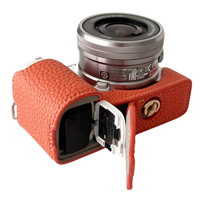 For Sony ZV-E10 Litchi Texture Leather Camera Bag Bottom Case with Battery Opening - Orange
