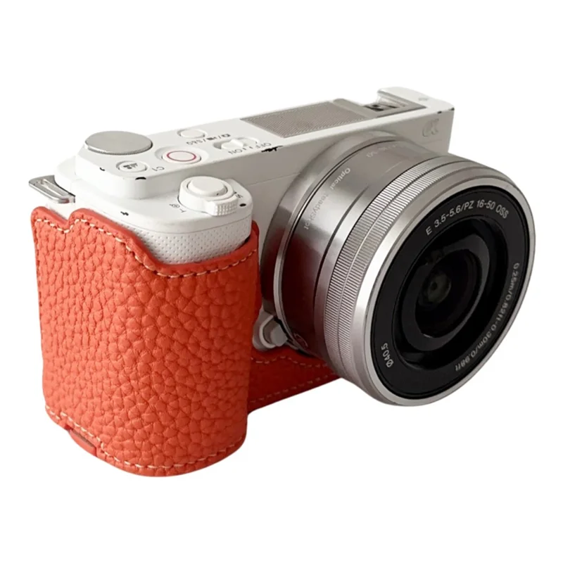 For Sony ZV-E10 Litchi Texture Leather Camera Bag Bottom Case with Battery Opening - Orange