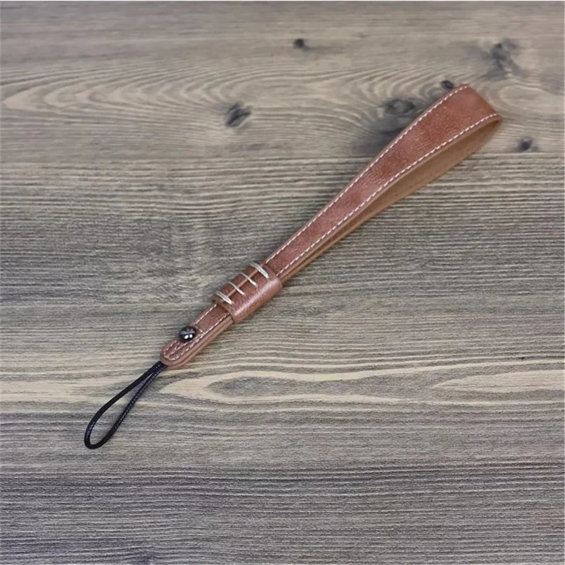 Per Fuji / Canon / Nikon / Panasonic DSLR Camera 2mm Connettore Cinturino da Polso in Pelle PU - Marrone