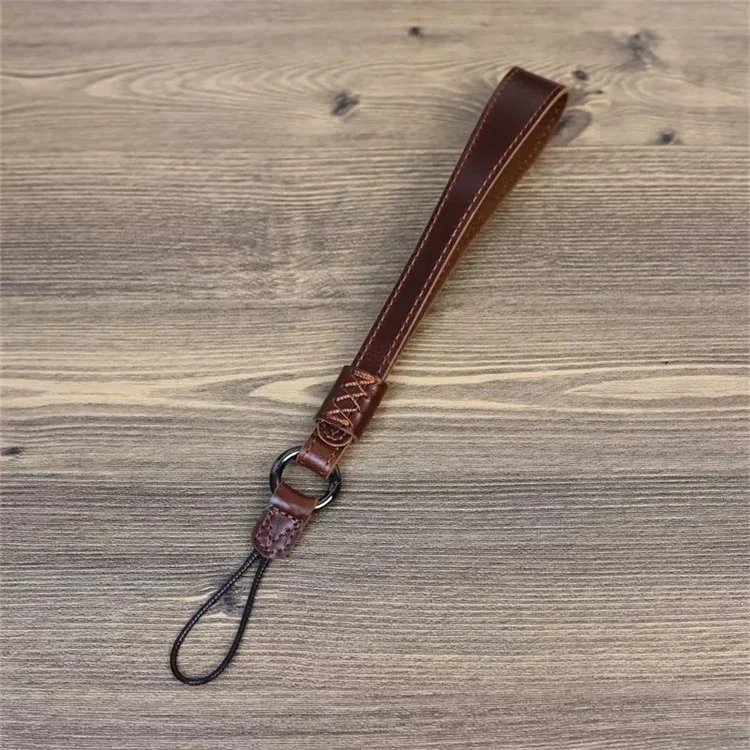 For Fujifilm XT4 / A7r5 / A7M4 / X100v / XH2 Camera Carrying Strap Top Layer Cowhide Leather Quick Release Hand Rope - Coffee