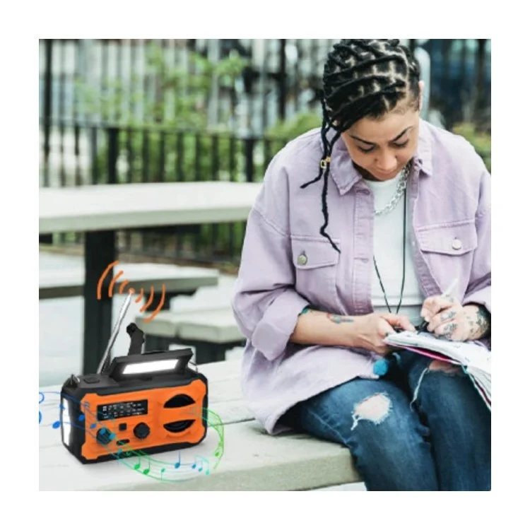 YX328 Torcia LED Solare Manuale di Emergenza 4000mAh Power Bank Radio FM Campeggio Strumento di Sopravvivenza - Arancione